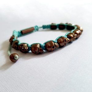 Solid Brass Skull Bracelet Braided with Turquoise Rope